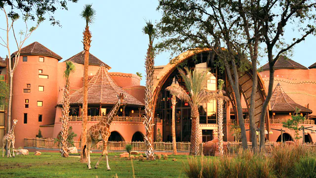 Exterior Shot of Animal Kingdom Lodge with A Giraffe