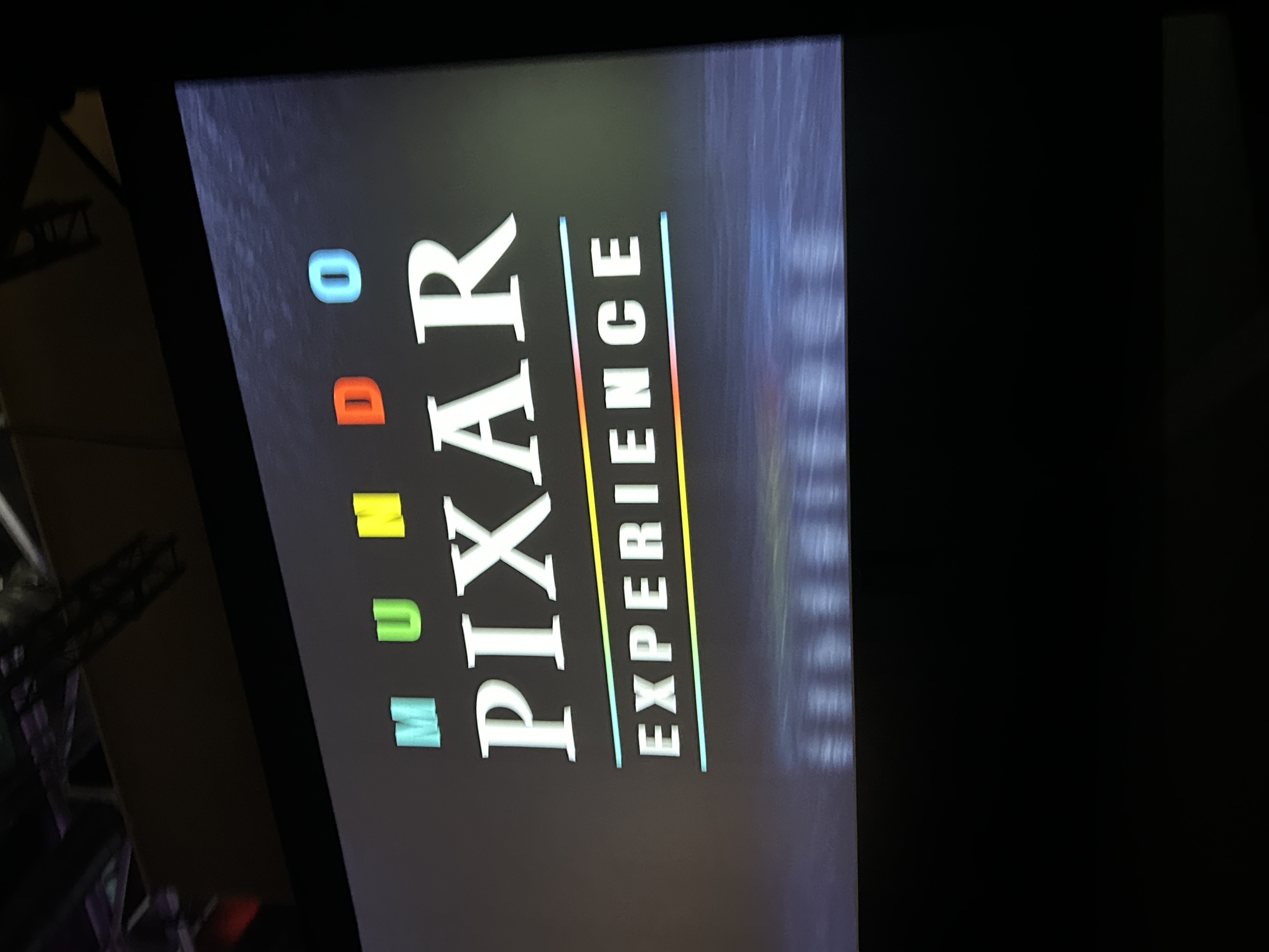 Picture shows a display screen with Mundo pixar experience displayed on in writing