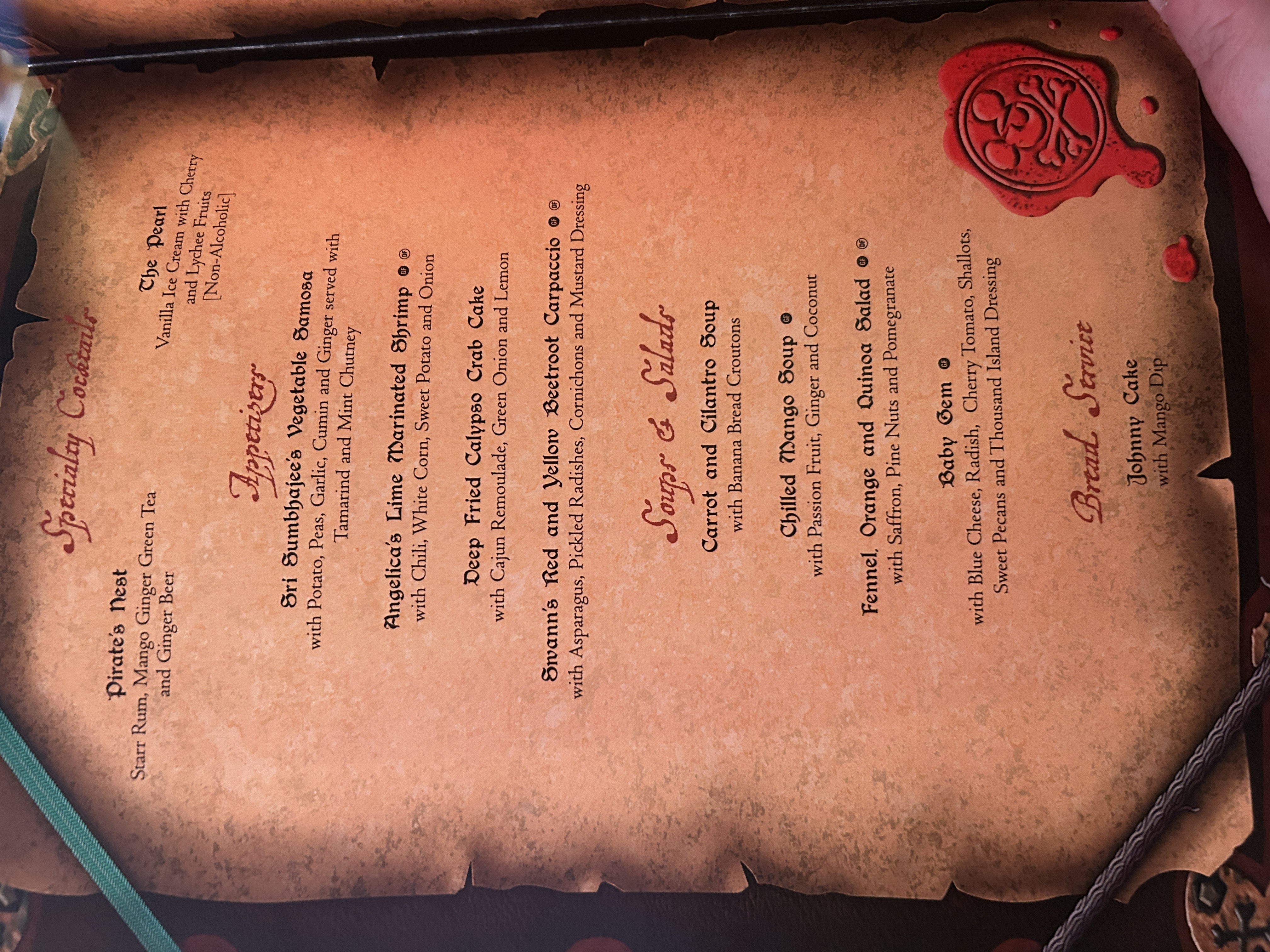 Image of menu cover with a pirate ship on