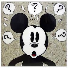 Black and white image of Mickey Mouse looking puzzled