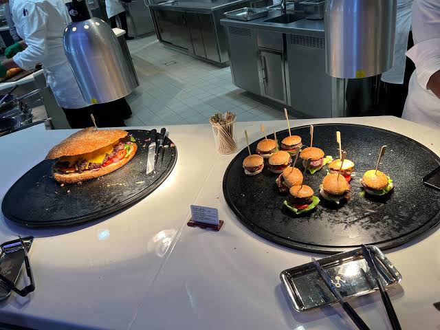 Super-sized burgers served by the slice at Pym Kitchen, Disneyland Paris