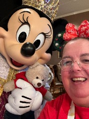 Minnie Mouse with a lady and a bear