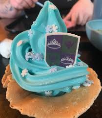 Blue tutti-frutti Arendelle Swirl ice cream in its edible bowl